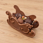 Traineau en chocolat garni
